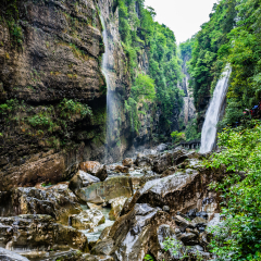 Enshi Mufu Grand Canyon landscape view with waterfall and pathway in Hubei China