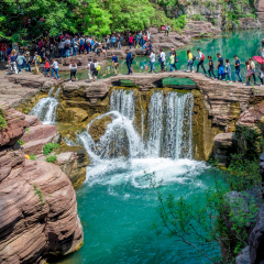 The Yuntaishan Geo Park, Henan, China. The view displays the rocks formations with turquoise pond and waterfall along the narrow canyon. The picture was taken on 29 April 2016 it is open for public
