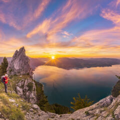 Photographer at sunset with View To Lake Attersee from Schober- Sunset at Mount Schoberstein, Alps