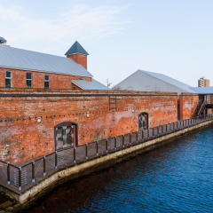 Kanemori Red Brick Warehouse and ferry boat in Hakodate, Hokkaido