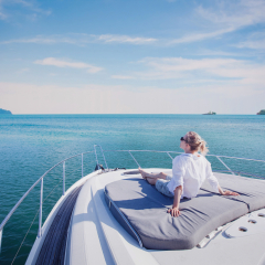 beautiful woman enjoying luxurious yacht cruise, sea travel by luxury boat