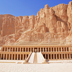 Entrance of the Mortuary Temple of Hatshepsut with cliffs and mountains in the background, Djeser-Djeseru, Deir el Bahari, near the Valley of the Kings, Luxor, Egypt.