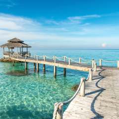 Summer, Travel, Vacation and Holiday concept - Wooden pier in Phuket, Thailand. 