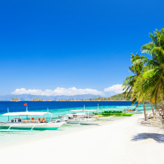 Filipino boat in the sea near the beauty beach at Boracay island, Philippines