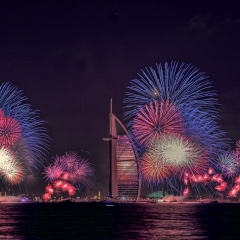 DUBAI, UAE - JANUARY 1: New year celebration with fireworks in Burj Al Arab and Burj Khalifa on January 1,2013 in Dubai, UAE
