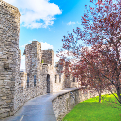 Inner view of Gravensteen castle or Castle of the Counts in Ghent, Belgium against cloudy blue sky