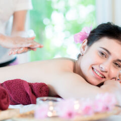 Yougn Asian woman relaxing with hand spa massage at beauty spa s