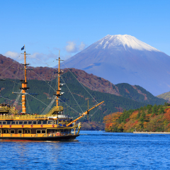 Mountain Fuji and Lake Ashi with Hakone temple and sightseeing boat in autumn