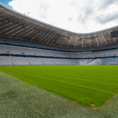MUNICH, GERMANY - JUNE 28: Allianz Arena football stadium on June 28, 2015 in Munich, Germany. The stadium has capacity for almost 70.000 spectators, making it the third largest stadium in Germany.