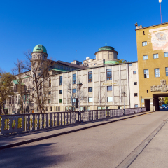 Munich, Germany - October 20, 2017:  The building of the German or Deutsches museum of science and technology, as seen from the bridge over the river Isar