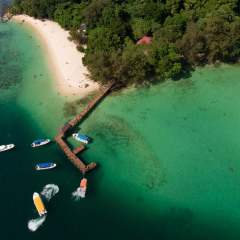 An aerial view Sapi Island is one of the most popular places in Sabah to swim, snorkel and relax and it is just 20 minutes boat ride away from Kota Kinabalu. 
