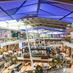 Phuket, Thailand - 3 january, 2017: Looking out from the top floor over the multiple levels of Central Festival Mall. Bright and colorful Central Festival, the Phuket's premier shopping destination