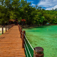 The beautiful tropical island called Sapi Island with clear sea water. Sapi Island is one of five tropical islands that comprise the Tunku Abdul Rahman Park.