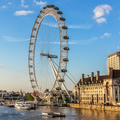 LONDON - JUNE 2, 2013: View of the London Eye at sunset. London Eye (135 m tall, diameter of 120 m) - a famous tourist attraction over river Thames in the capital city London. 