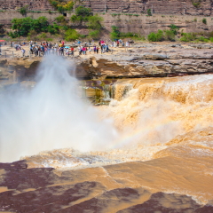 Jixian, Shanxi/CHINA-AUG27: Hukou waterfall on Aug 27, 2015 in Jixian, Shanxi, China. It is the biggest yellow waterfall in China. 