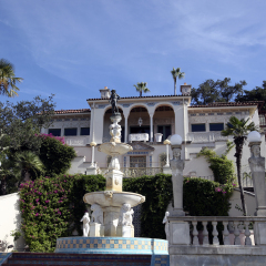 SAN SIMEON, CALIFORNIA - NOVEMBER 3, 2010 - The Hearst Castle, designed by architect Julia Morgan and owned by newspaper mogul William Randolph Hearst, looms high above the Pacific Coast Highway 1.