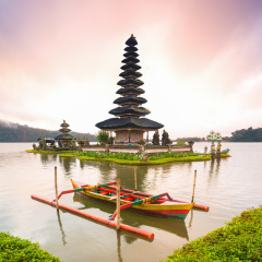 A beautiful sunrise at a Lake Bratan with Pura Ulun Danu Bratan Temple, Hindu temple on Bratan lake landscape, Major Shivaite and water temple Bali, one of famous tourist attraction in Bali  Indonesia