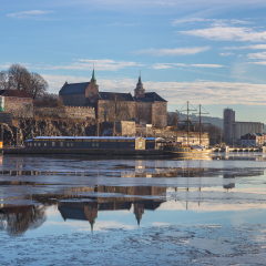 Akershus Fortress in Oslo, Norway. View from the Aker Brygge Marina. Oslo, Norway.