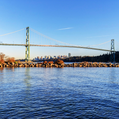 Lions gate bridge from West Vancouver, Canada - with Vancouver city center in the background and a jetty in the foreground