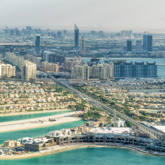 Dubai Palm Jumeirah and cityscape from helicopter.
