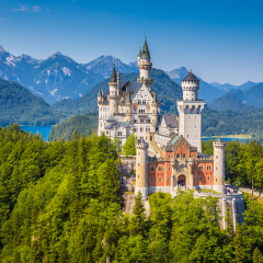 Beautiful view of world-famous Neuschwanstein Castle, the 19th century Romanesque Revival palace built for King Ludwig II, with scenic mountain landscape near Fussen, southwest Bavaria, Germany