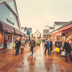 Oct 26,2017 - Bicester Village, London : Inner view of Bicester Village outlet at a rainy day