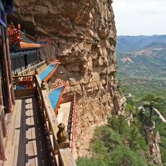 Hengshan, China - July 21, 2009. Taoist temple carved in rock with large vistas of space below in North China, near Datong, Shanxi Province on July 21, 2009.