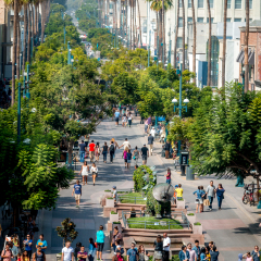SANTA MONICA, CALIFORNIA - OCTOBER 31, 2015: Tourists and locals alike shop along the 3rd Street Promenade in Santa Monica.