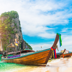 Longtail boat parked on natural sea beach waiting travelers, Ao nang beach, Andaman sea, Krabi near Phuket, Water travel Thailand, Tourism beautiful destination Asia, Summer holiday vacation trip