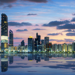 View of Abu Dhabi Skyline at sunset, United Arab Emirates 