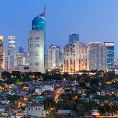 Jakarta downtown skyline with high-rise buildings at sunset