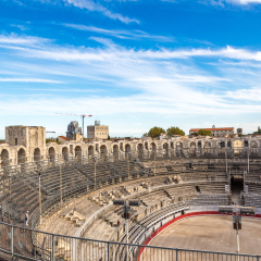 Arena and roman amphitheatre in Arles, France in a beautiful summer day