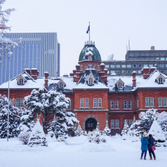 View of the Former Hokkaido Government Office in Sapporo, Hokkaido, Japan. Traveler take a photo at the Former Hokkaido Government Office in Sapporo, Hokkaido, Japan in winter